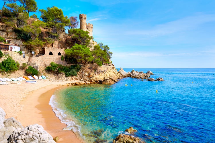 Lloret de Mar Castell Plaja at Sa Caleta beach in costa Brava of Catalonia Spain.