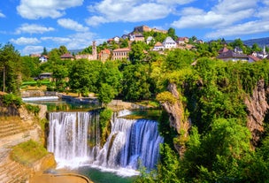 Photo of aerial view of the old bridge and river in city of Mostar, Bosnia and Herzegovina.