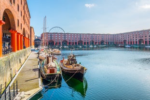 Photo of aerial view of the famous Blackpool Tower and beach on a beautiful Summer day on one of Great Britains most popular holiday destinations, England.