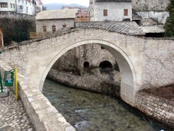 Photo of aerial view of the old bridge and river in city of Mostar, Bosnia and Herzegovina.