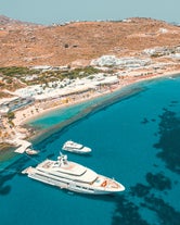 Photo of aerial view of the beautiful beach of Agios Ioannis Diakoftis on the island of Mykonos, Greece.