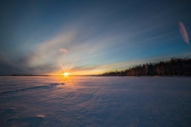 Ice fishing on a frozen lake