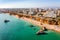 Photo of aerial view of touristic Portimao with wide sandy Rocha beach, Algarve, Portugal.