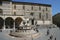 photo of view  of The cathedral's south wall with the Loggia di Braccio on the left and the Fontana Maggiore in the foreground, Perugia, Italy.