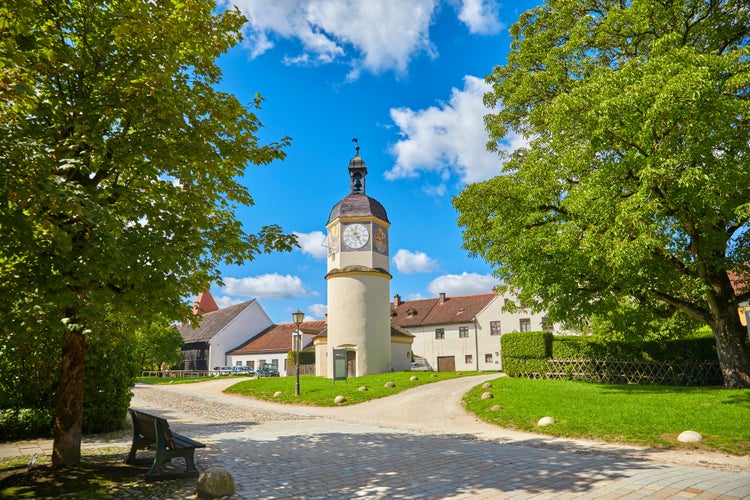 View of the famous castle complex of Burghausen, with the clock tower. It is the longest castle complex in the world. In Bavaria, Germany.