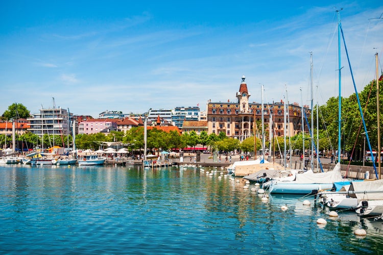 Photo of yachts in Lausanne port. Losanna is capital city and biggest town of Vaud canton, located on shores of Lake Geneva in Switzerland.