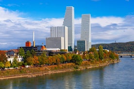 View of the Old Town of Basel with red stone Munster cathedral and the Rhine river, Switzerland.