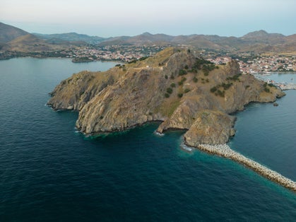 Photo of The castle of Myrina on the island of Limnos. With the old port and the city as a background.
