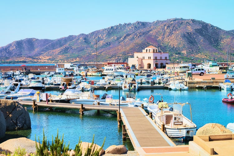 Port with ships and yachts, Villasimius, Cagliari, South Sardinia in Italy.