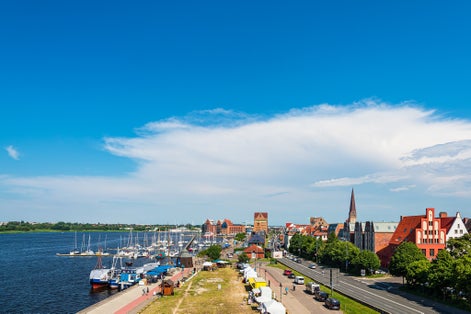 photo of aerial view of historical buildings in the city of Rostock, Germany.