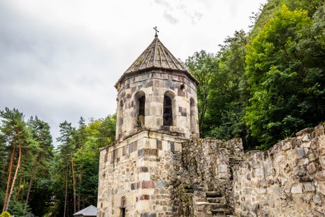 Photo of Mtsvane Monastery bell tower near Batumi Georgia pilgrimage destination at day.