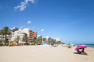 Photo of aerial view of coast at Calafell cityscape with modern apartment buildings, Spain.