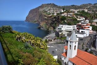 Aerial drone view of Camara de Lobos village, Madeira.