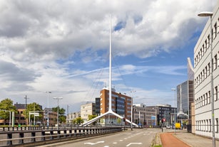 Amsterdam Netherlands dancing houses over river Amstel landmark in old european city spring landscape.