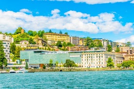 Panoramic view of historic Zurich city center with famous Fraumunster, Grossmunster and St. Peter and river Limmat at Lake Zurich on a sunny day with clouds in summer, Canton of Zurich, Switzerland