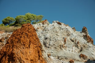 Photo of Heraion in Perachora with small beach, Loutraki, Greece.