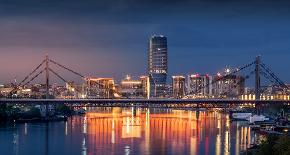 Photo of panoramic night view of Belgrade Waterfront, river Sava and Old Belgrade, Serbia.