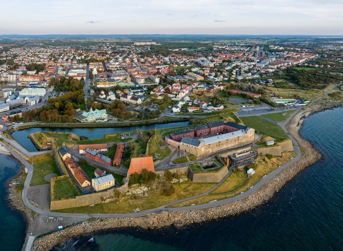 photo of Varberg city seen from above with in the foreground Varberg fortress, a historic defense facility that was originally built at the end of the 13th century.