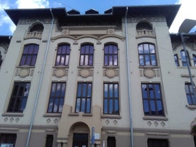 Photo of the facade of the Administrative Palace of Craiova (today Dolj Prefecture and County Council), an imposing historical monument located on the territory of Craiova, Romania.