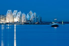 Scenic summer view of Nyhavn pier with color buildings, ships, yachts and other boats in the Old Town of Copenhagen, Denmark