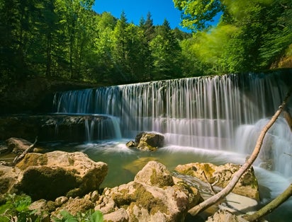 photo of a Gorges de 'Areuse Waterfall in Trois-Rods, Switzerland.
