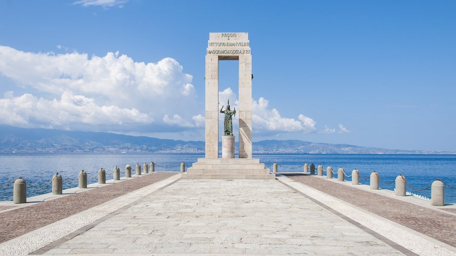 Athena statue in front of the sea, Arena dello Stretto in Reggio Calabria, Italy. The ancient goddess of philosophy and wisdom.