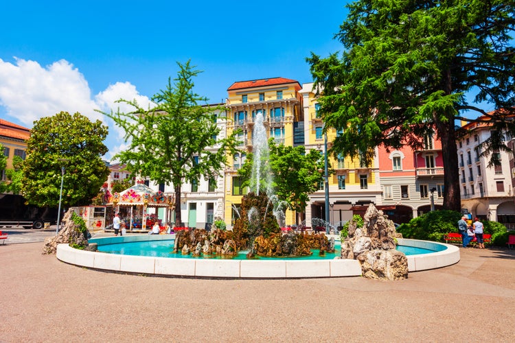 Photo of fountain at the Piazza Alessandro Manzoni, the main square in Lugano city in canton of Ticino, Switzerland.