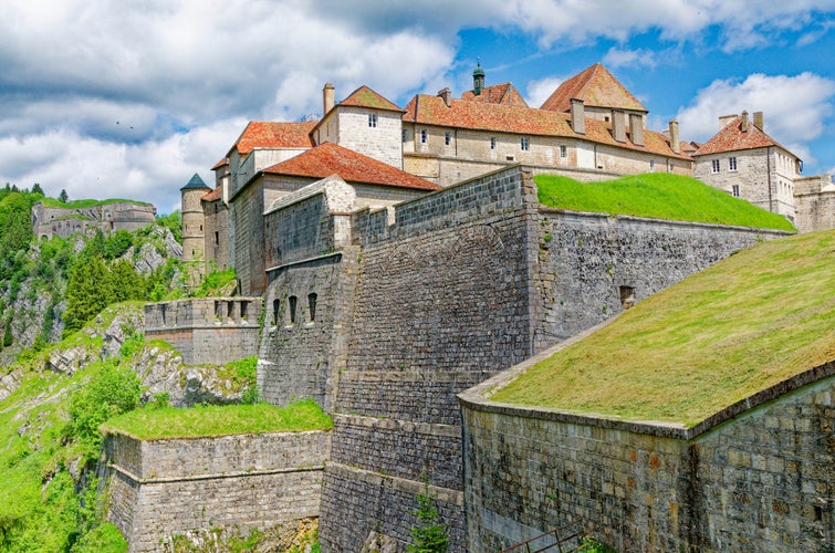 photo of view of The Château de Joux is a castle, later transformed into a fort, located in La Cluse-et-Mijoux.