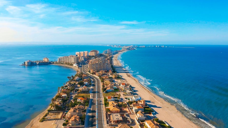 Aerial view. Panoramic view of streets, roads and buildings foreland La Manga del Mar Menor, Cartagena, Murcia, Spain