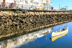 Photo of aerial view of pier fishing boats in the village Cabanas de Tavira, Portugal.