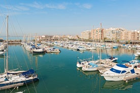 photo of aerial panoramic drone point of view Cabo Roig coastline with blue Mediterranean Seascape view, residential buildings near sandy beach at sunny summer day. Province of Alicante, Costa Blanca. Spain.