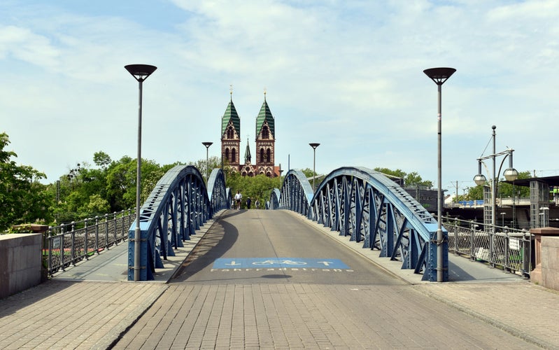 photo of blue bridge in Freiburg im Breisgau in Germany.