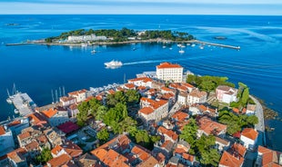 Photo of aerial view to the town of Porec in Istria, Croatia on Adriatic coast.