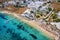 Photo of aerial view of the beautiful beach of Agios Ioannis Diakoftis on the island of Mykonos, Greece.