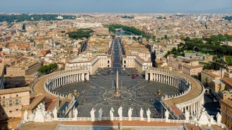 Aerial panoramic cityscape of Rome, Italy, Europe. Roma is the capital of Italy. Cityscape of Rome in summer. Rome roofs view with ancient architecture in Italy. 