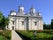 photo of Golia Monastery Iasi with blue sky behind in the summer .