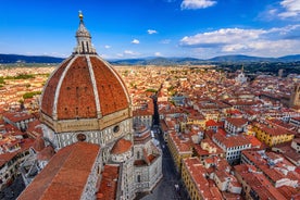 Famous buildings, gondolas and monuments by the Rialto Bridge of Venice on the Grand Canal, Italy.