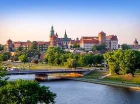 Photo of Lednice Chateau with beautiful gardens and parks on a sunny summer day, Czech Republic.