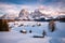 photo of skiing in the Alpe di Siusi with snow in winter, Dolomites, Italy.