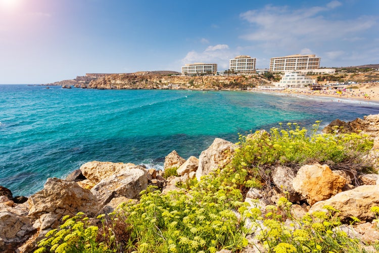 Photo of blue beach water of Manikata, Malta.