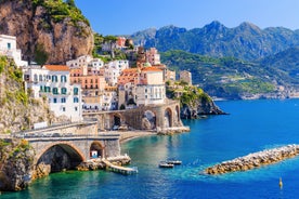 Photo of aerial morning view of Amalfi cityscape on coast line of Mediterranean sea, Italy.