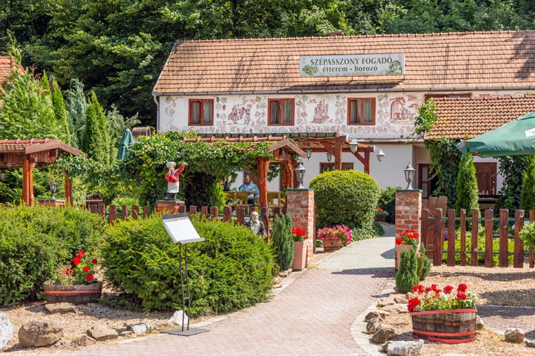 Photo of Eger , Hungary - July 08, 2019: Restaurant in the Valley of the beautiful Woman with many wine cellars.