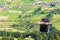 photo of tourists (faces not visible) climbing the cable car in an open car up Mount Stanserhorn in Switzerland and admire the magnificent aerial panorama of central Switzerland, mountains, villages and forest.