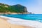 photo of Cleopatra beach with sea, sand and rocks in Alanya, Antalya, Turkey.