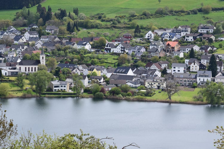 Photo of Schalkenmehrener Maar in the Eifel during springtime on Germany.