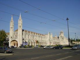 Photo of Lisbon City Skyline with Sao Jorge Castle and the Tagus River, Portugal.