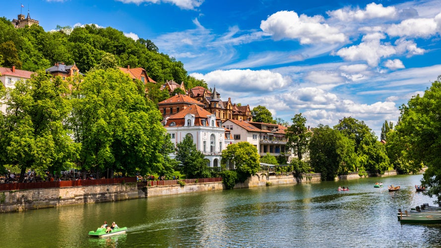 Beautiful floral colorful town Tubingen in Germany (Baden-Wurttemberg). Houses at river Neckar and Hoelderlin tower, Tuebingen, Baden-Wuerttemberg, Germany. Tubingen, Germany.