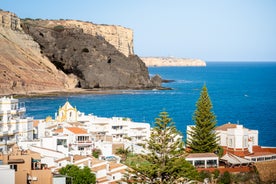 Photo of Carvoeiro fishing village with beautiful beach and colourful houses, Portugal.