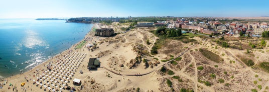 Photo of panoramic aerial view over small ancient resort town of Pomorie with old European small houses , Bulgaria.