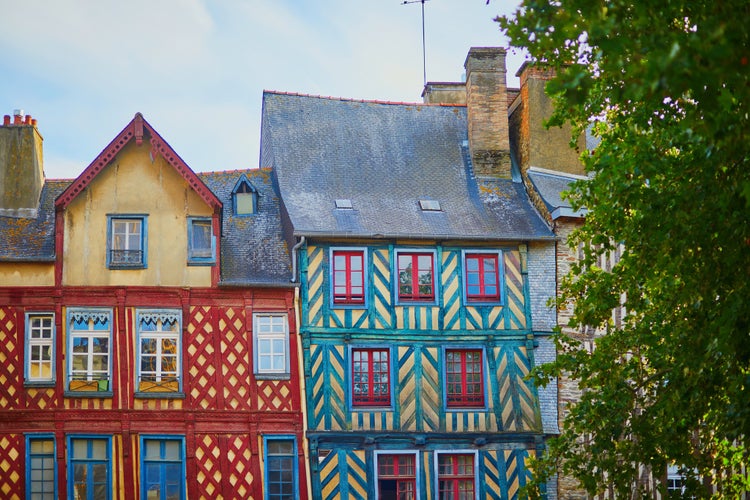 Photo of beautiful half-timbered buildings in medieval town of Rennes, France.